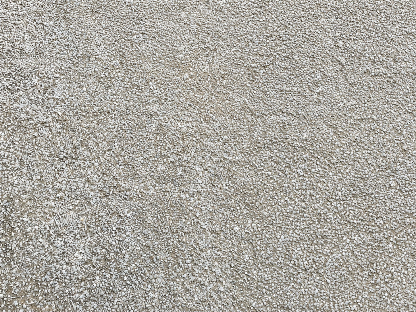 Pebble dash render restored to its original colour after softwashing