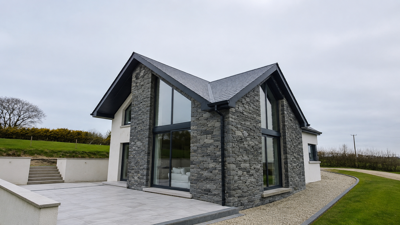 Stock image of an architectural home with large feature windows for ÉireShine window cleaning guide pricing